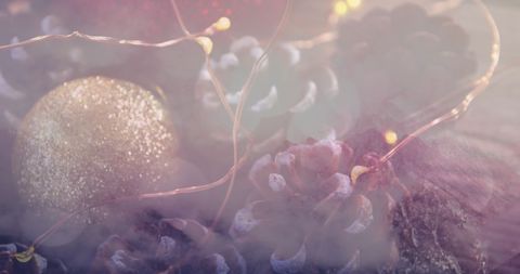 Glistening Christmas Baubles and Pine Cones with Festive Lights