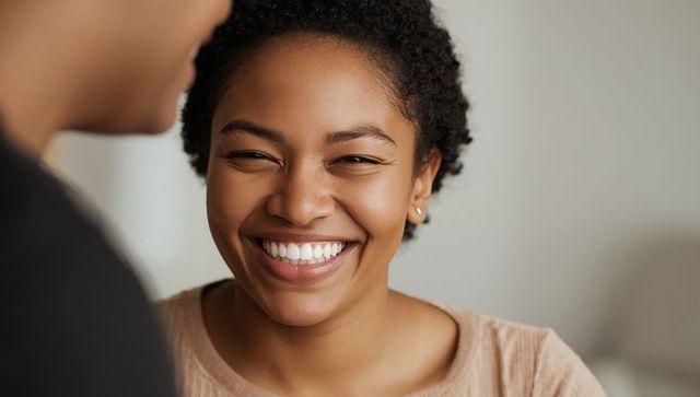 Joyful moment of connection with smiling curly woman