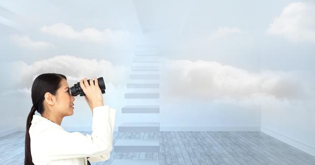 Businesswoman using binoculars with a creative stairway and clouds background, symbolizing vision, future aspirations, and the pathway to success. Perfect for use in business contexts to illustrate strategic planning, goals, innovation, and corporate vision.
