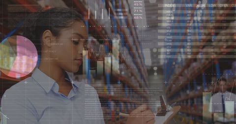 Warehouse supervisor analyzing inventory with overlain data visuals