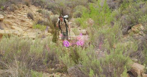 Explorer with ar technology navigating desert terrain