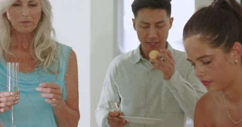 Guests Enjoying Social Event in Joyful Atmosphere