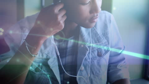 Schoolgirl Using Headphones in Digital Network Connection Interface
