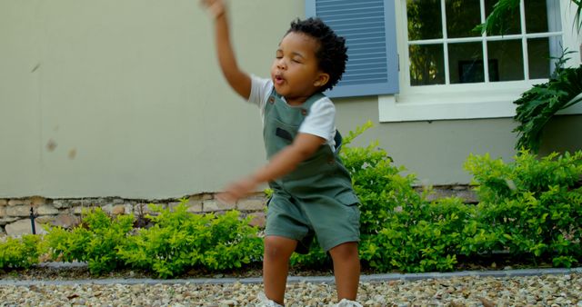 Energetic Toddler Playing Outdoors in Summer - Download Free Stock Images Pikwizard.com