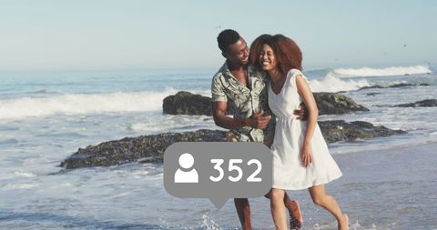 African American Couple Enjoying Summer Beach Walk - Download Free Stock Images Pikwizard.com
