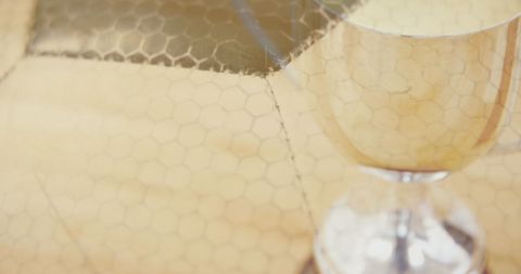 Soccer Ball Reflected in Silver Trophy Celebrating Victory