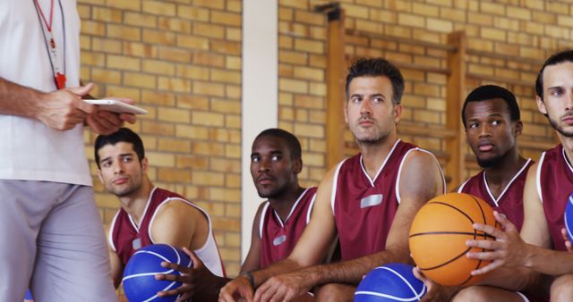 Basketball Team Bench Listening to Coach During Game - Download Free Stock Images Pikwizard.com