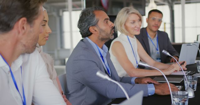 Diverse Business Team Discussing Strategy in a Conference Room - Download Free Stock Images Pikwizard.com