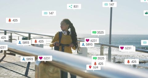 Woman Engaged with Social Notifications on Seaside Walk