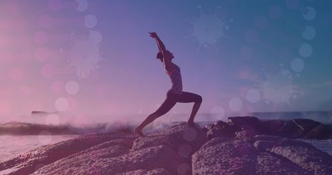 Serene Woman Practicing Yoga on Seaside Rocks at Sunset - Download Free Stock Images Pikwizard.com