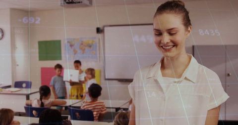 Smiling Teacher Guiding Classroom Presentations with Technology