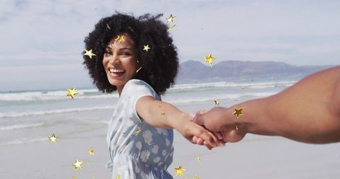 Joyful Woman Walking on Beach with Positive Outlook in Summer Sunshine