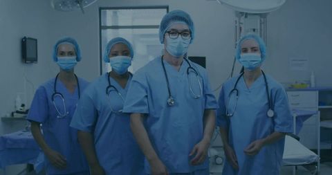 Medical Team in Surgeon's Clothing in Operating Room