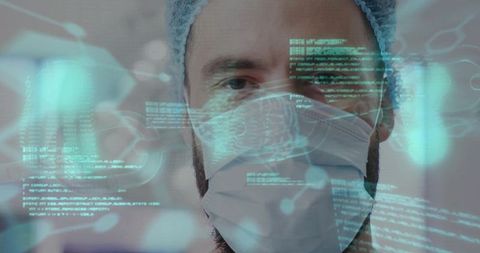 Clinician wearing surgical mask viewing digital diagnostics overlay for telemedicine
