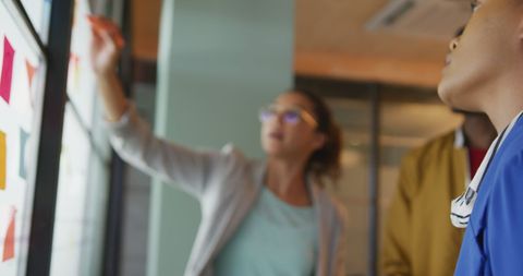 Diverse Team Collaborating on Ideas with Sticky Notes