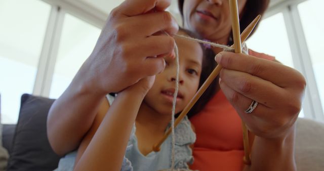 Mother Teaching Daughter How to Knit at Home - Download Free Stock Images Pikwizard.com