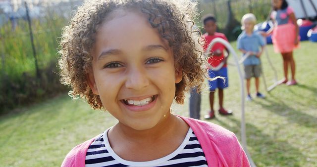 Cheerful Child Smiling in Outdoor Playful Setting - Download Free Stock Images Pikwizard.com