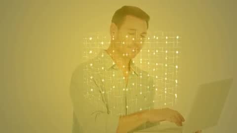 Man Engaging with Digital Interface Through Laptop