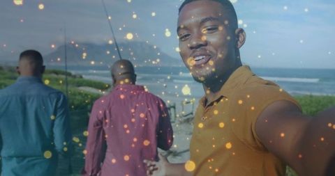 Group of Friends Enjoying Coastal Adventure and Capturing Memories