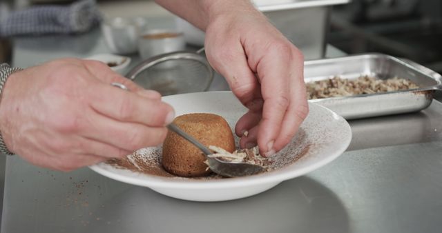 Chef adding finishing touches to a gourmet dessert in a professional kitchen with meticulous detail. Ideal for use in culinary magazines, food blogs, gourmet cooking websites, and any marketing material related to high-end culinary services.