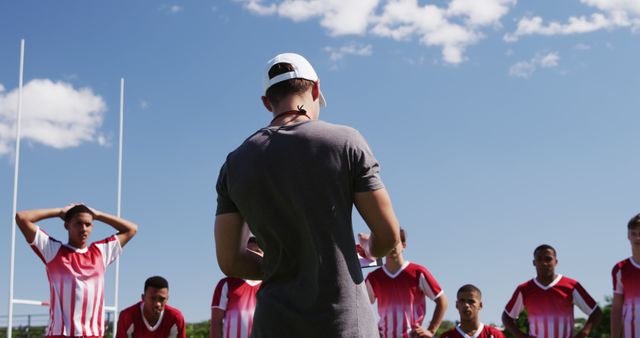 Coach Instructing Youth Soccer Team on Field - Download Free Stock Images Pikwizard.com