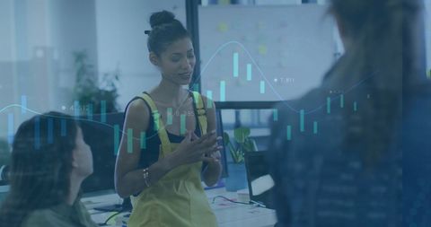 Diverse Team Collaborating with Financial Data Overlays