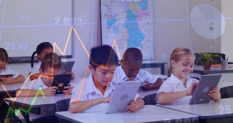 Children engaged with tablets in connected classroom innovation
