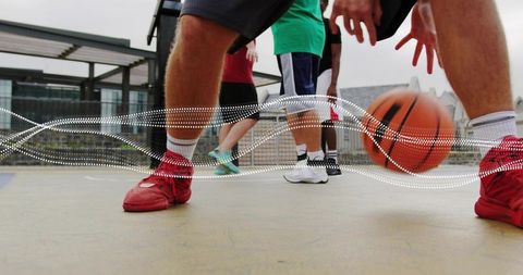 Players on Rooftop Improvised Soccer Field with Iron Net: Skill Builds Team Spirit Amid City Vibes