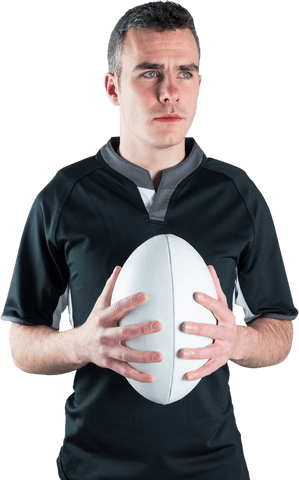 Transparent portrait of determined rugby player holding ball