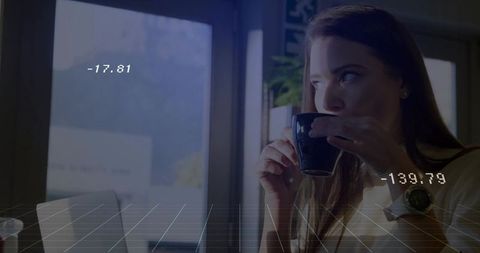 Woman embracing modern digital lifestyle in urban cafe