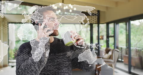 Man Drinking Coffee with Global Network Overlay