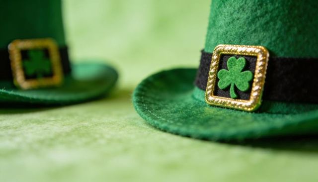 Green Felt Leprechaun Hat with Gold Shamrock Buckle Close-up for St Patricks Day