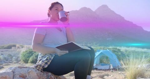 Woman Enjoying Nature, Campground Coffee Break with Scenic Mountain View