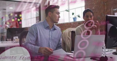 two employees engaging in a collaborative discussion in a modern office. suitable for illustrating concepts of teamwork, collaboration, business environments, and innovative project planning in both corporate and start-up settings. use in articles, websites, or presentations about office dynamics, modern work practices, or technological integration.