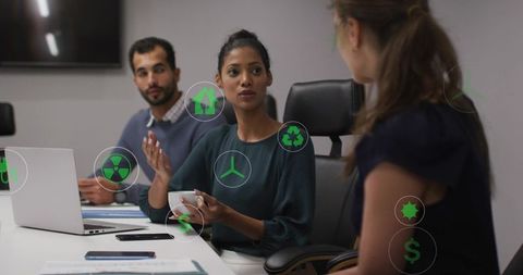 Female executive presenting sustainability, energy and finance during boardroom meeting