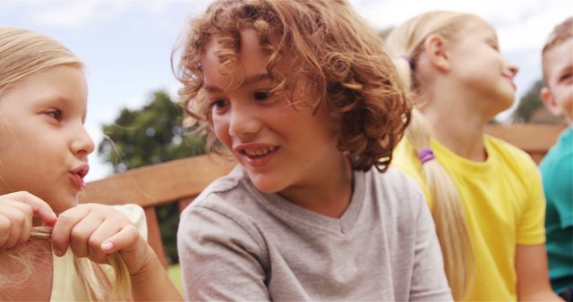 Happy Children Interacting Outdoors on a Sunny Day - Download Free Stock Images Pikwizard.com