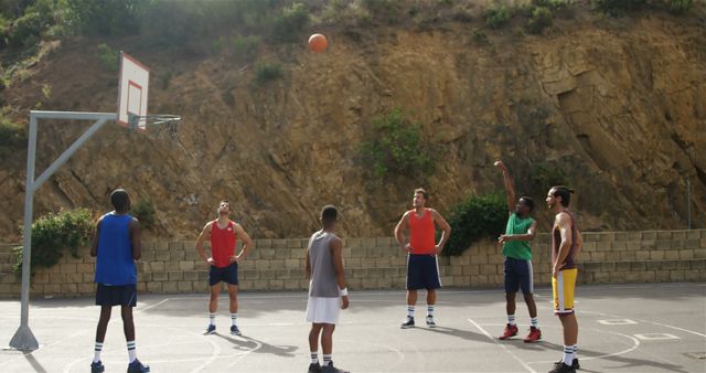 Group of Friends Playing Outdoor Basketball Game - Download Free Stock Images Pikwizard.com