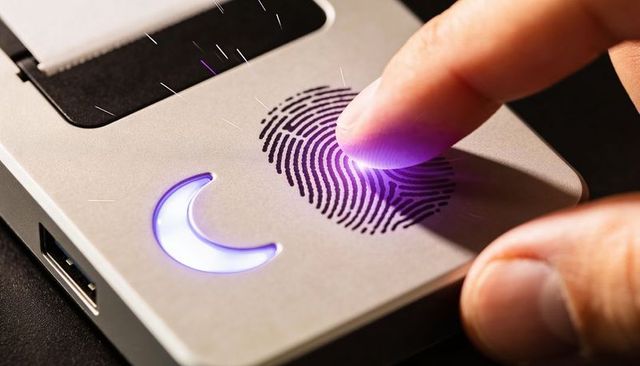 Activating biometric fingerprint scanner with purple led crescent and usb port