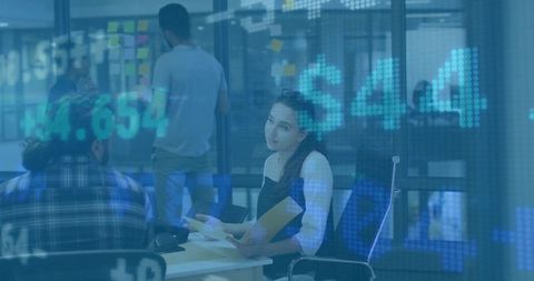 Innovative team collaboration with modern technology overlay