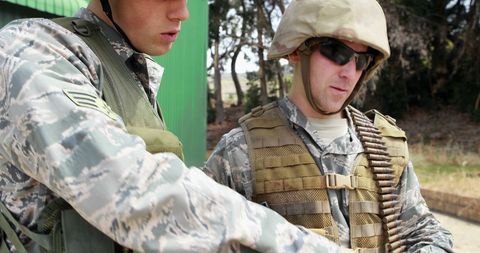 Military Personnel Fraught with Focus During Strategic Briefing - Download Free Stock Images Pikwizard.com