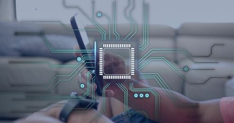 Holding smartphone displaying microchip circuit overlay for mobile security and privacy