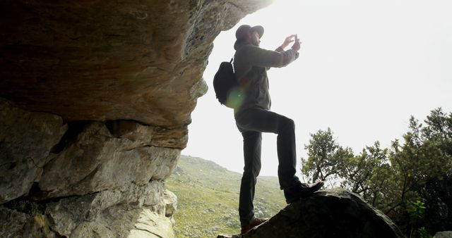 Man Exploring Rocky Caves in Nature - Download Free Stock Images Pikwizard.com