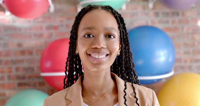 Confident African American Woman Smiling at Fitness Center - Download Free Stock Images Pikwizard.com