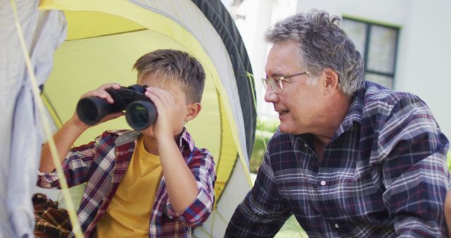 Grandfather and Grandson Camping with Binoculars - Download Free Stock Images Pikwizard.com