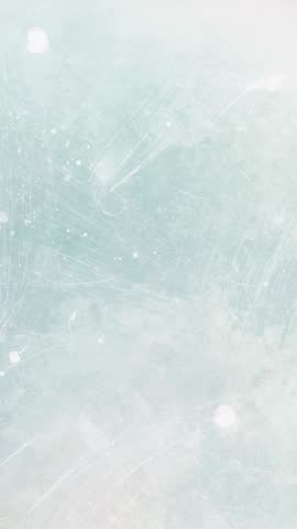 Flowing pastel gradient with soft light orbs and fine scratches vertical abstract video