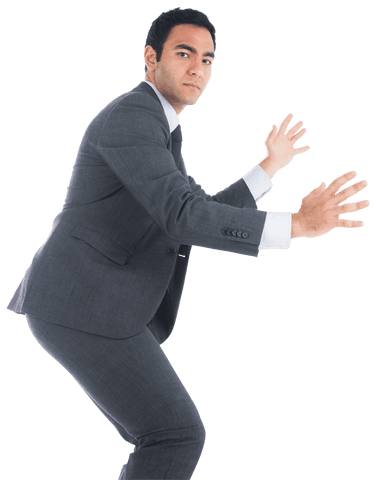 serious businessman in suit holding invisible object on transparent background - Download Free Stock Videos Pikwizard.com