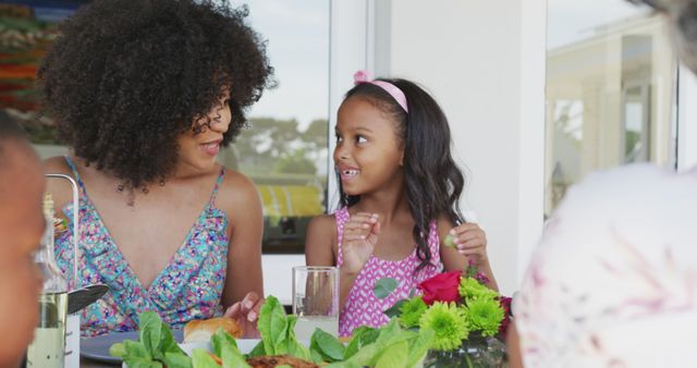 Mother and Daughter Enjoying Outdoor Family Meal - Download Free Stock Images Pikwizard.com