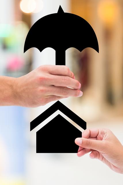 Concept image of hands holding an umbrella graphic over a house graphic, symbolizing protection and insurance coverage. Useful for themes related to homeowners insurance, property safety, financial security, and coverage policies. Ideal for marketing materials, insurance company promotions, and educational content about insurance and property protection.