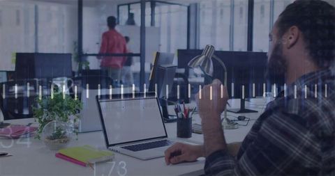 Professional office worker typing in trendy coworking space