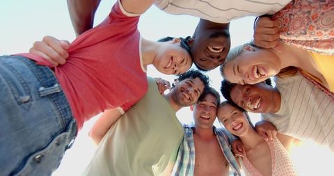 Joyful Diverse Friends Laughing in Outdoor Circle on a Sunny Day - Download Free Stock Images Pikwizard.com